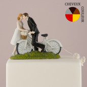 La figurine couple à vélo en porcelaine