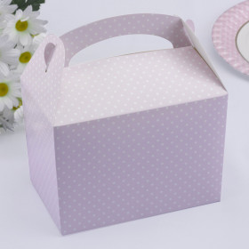 La boîte à gâteau rose à pois