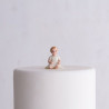 La figurine du bébé fille assis 1