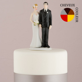 La figurine de mariage pincée d'amour