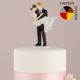 La figurine mariée dans les bras du marié