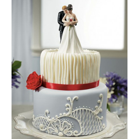 La figurine couple enlacé La figurine couple enlacé