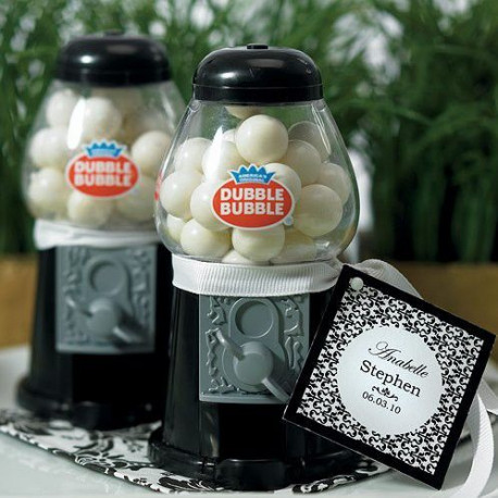 Le mini distributeur à boules de gum noir Le mini distributeur à boules de gum noir