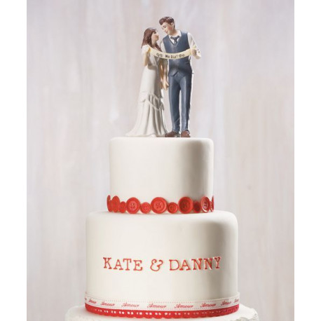 La figurine mariés à la banderole